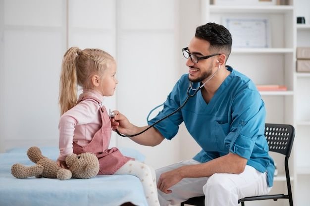 Free Photo Doctor doing their work in pediatrics office